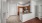 a kitchen with fruit-wood cabinets
