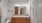spacious bathroom with large vanity mirror and double vanity sinks