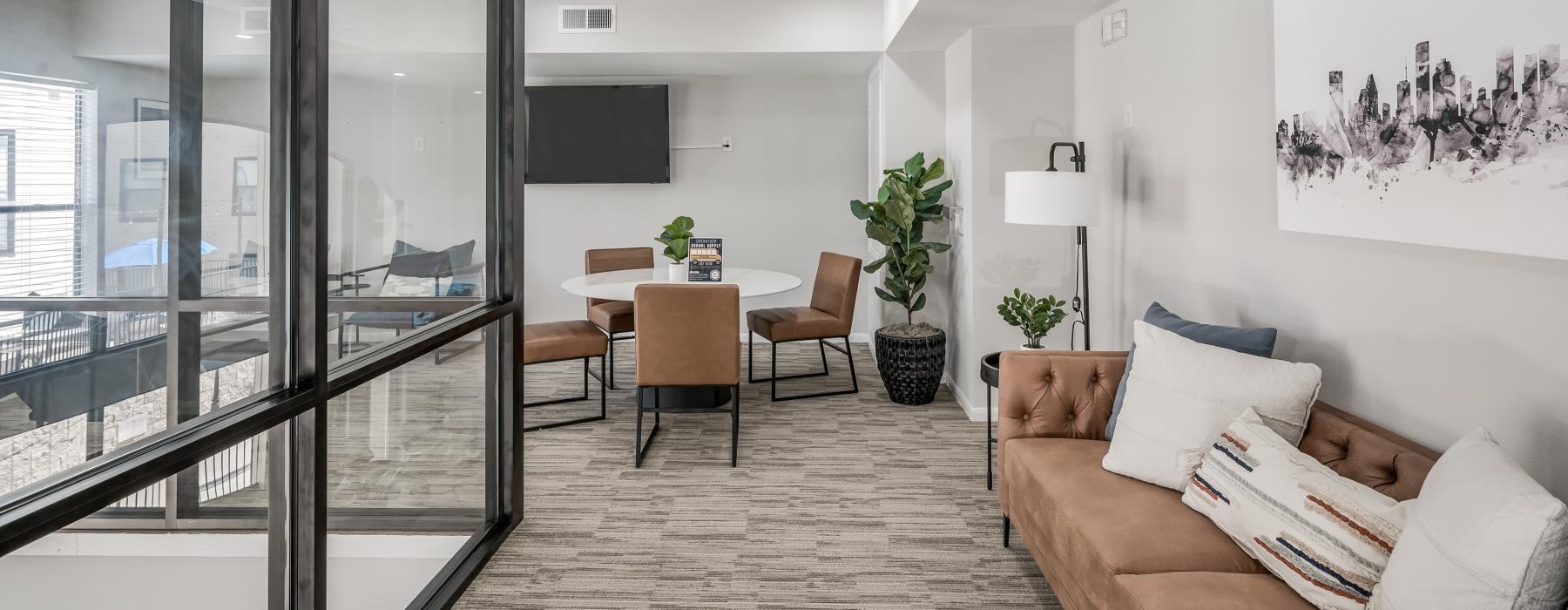 a spacious room with a glass walls