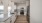 a kitchen with white cabinets