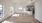 a large kitchen with a wood floor