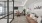 a spacious room with a glass walls