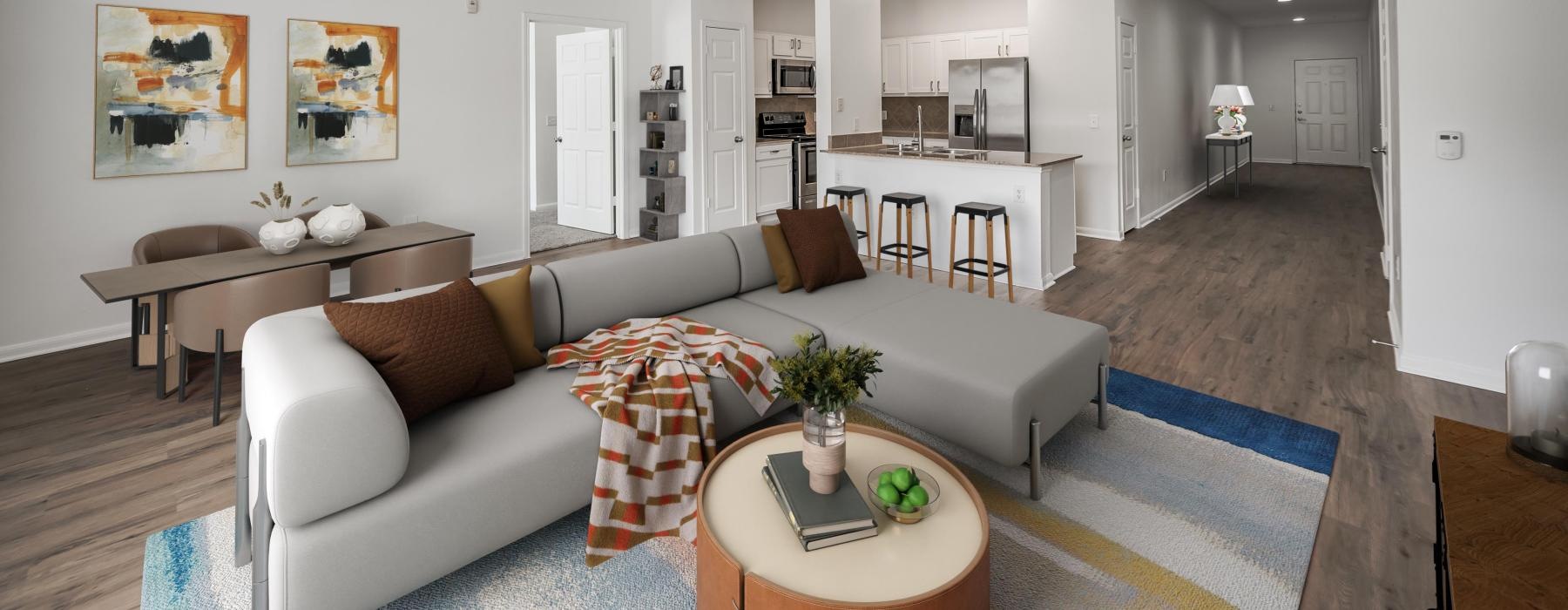 a living room with a couch and a table