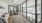 a room with glass walls and a large glass door