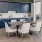 a kitchen with a table and chairs