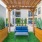 an outdoor lounge with a blue sofa